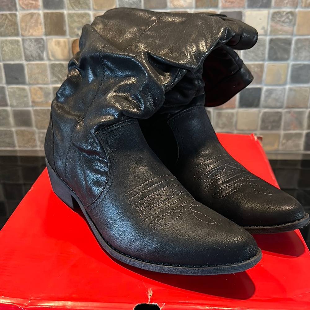 Black cowboy type tall boots